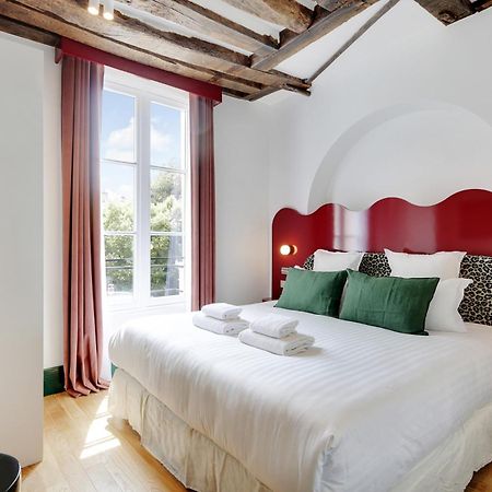 Paris Home Collection Serviced Apartments In Notre Dame - Rue Savoie Bagian luar foto